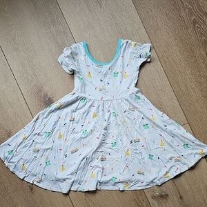 Kyte BABY White and Green Pleated Sundress with Puff Sleeves